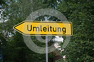 Traffic sign `Umleitung` German for Detour photo